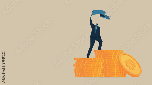 A man is waving a flag on top of a pile of Bitcoins.