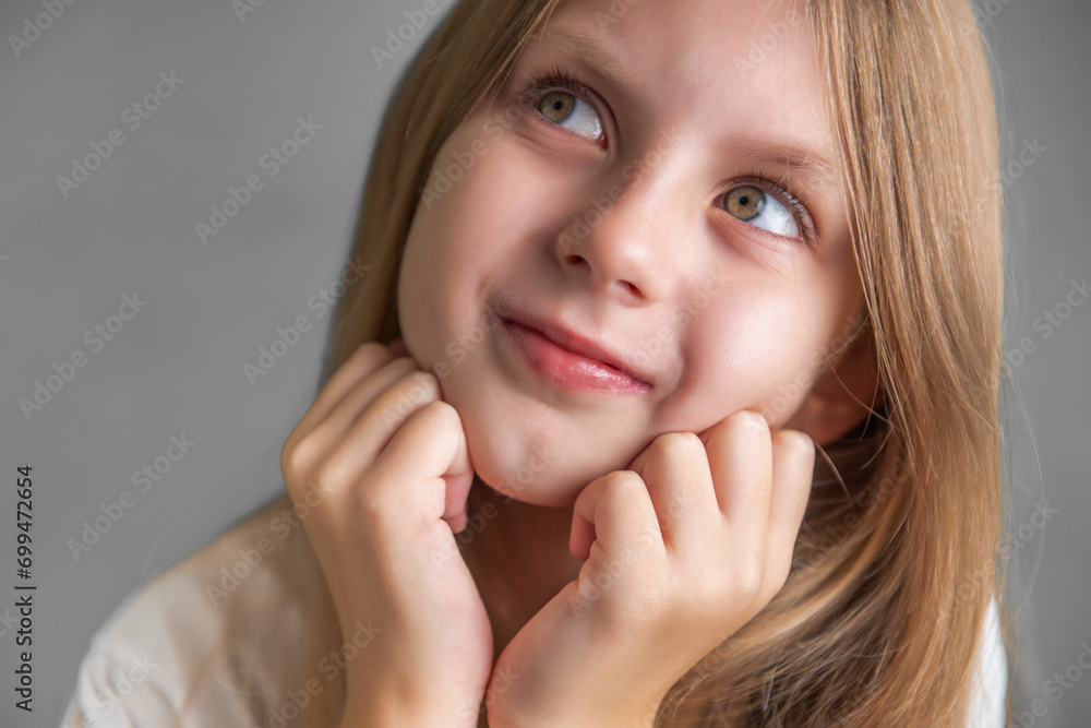 Portrait of positive cheerful girl cutely smiling Portrait of positive cheerful girl cutely smiling