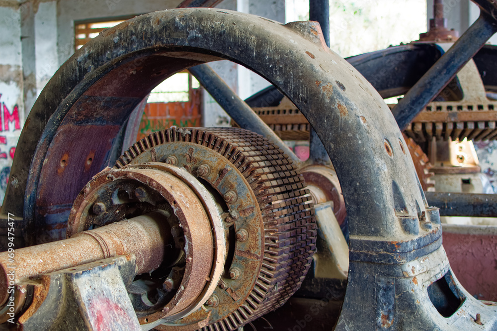 Metal parts of old and abandoned hydro power plant facilities.