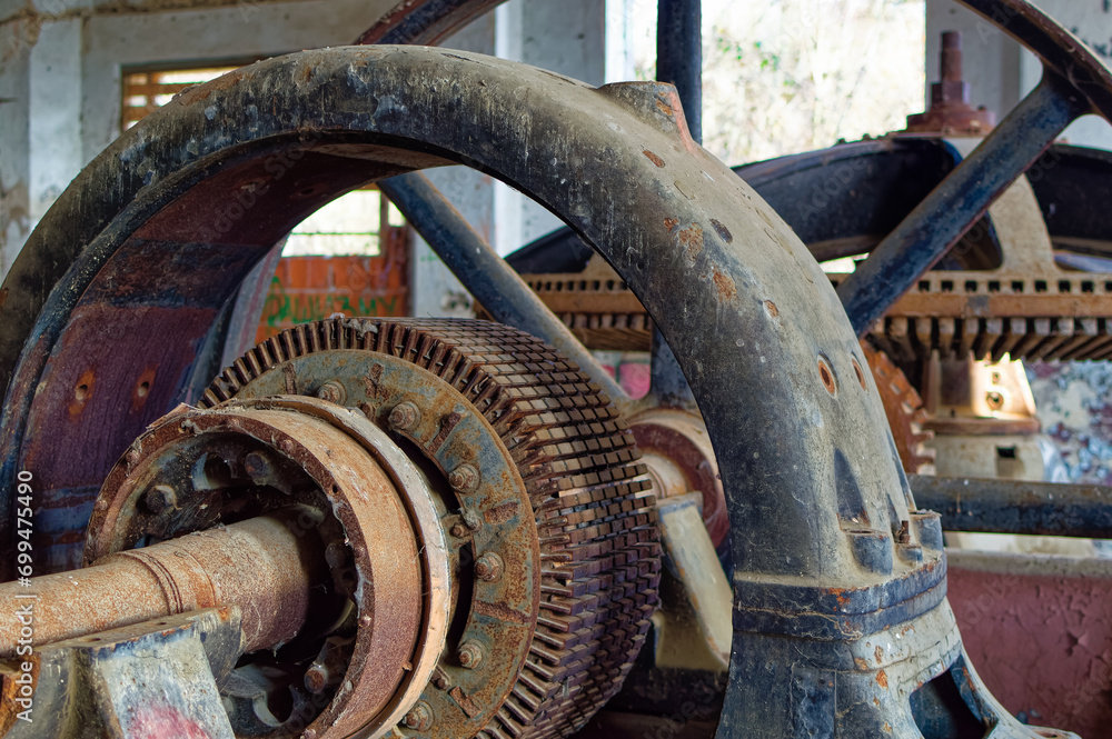 Metal parts of old and abandoned hydro power plant facilities.