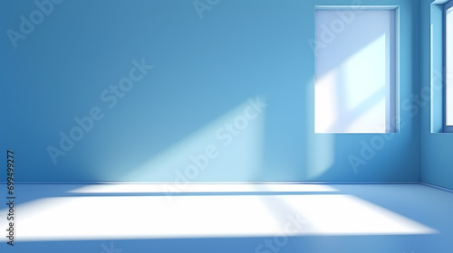 An empty blue room with a window and a shadow in the window