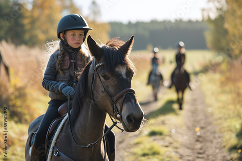 Children ride horses, outdoors, equestrian sport for children