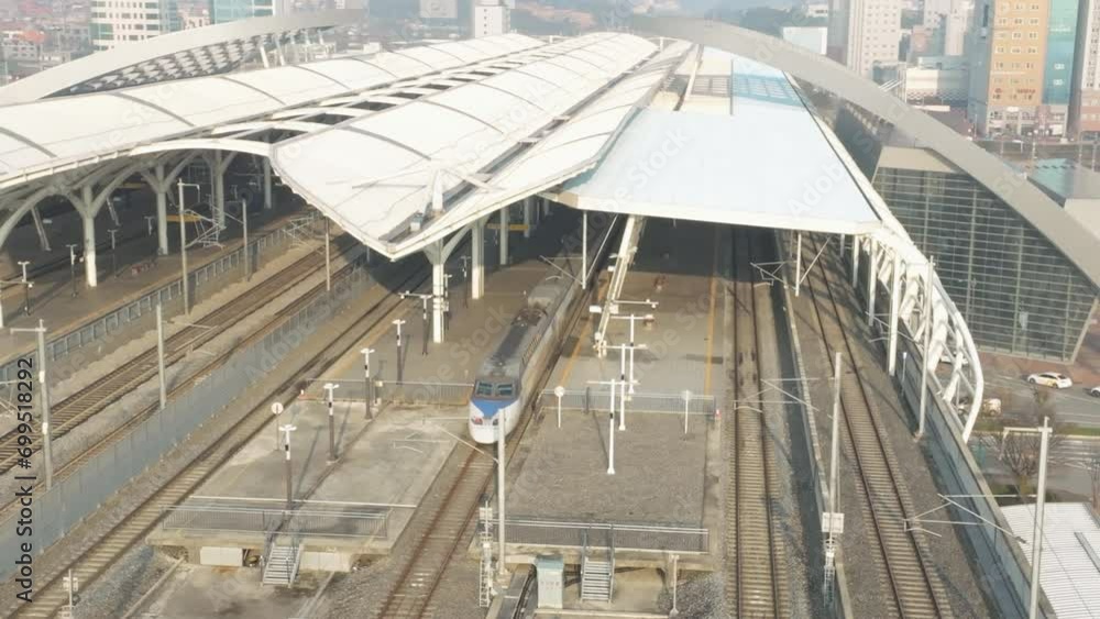 a high-speed train departing from a station, KTX train in Korea, Osong station a high-speed train departing from a station, KTX train in Korea, Osong station
