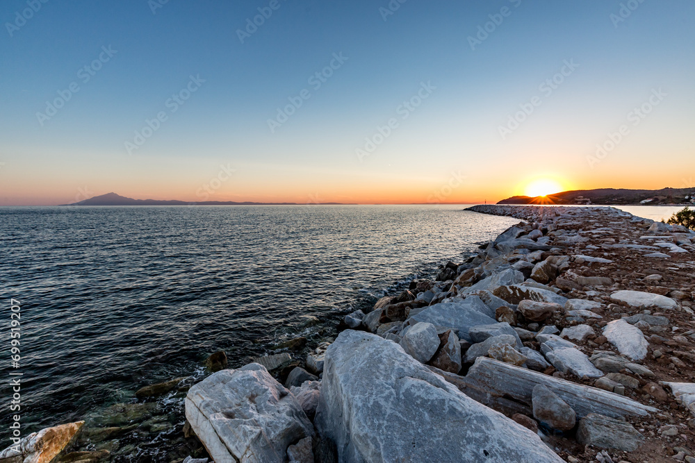 Sunset travel photograph from the sea port near Limenaria, Thasos island, Greece