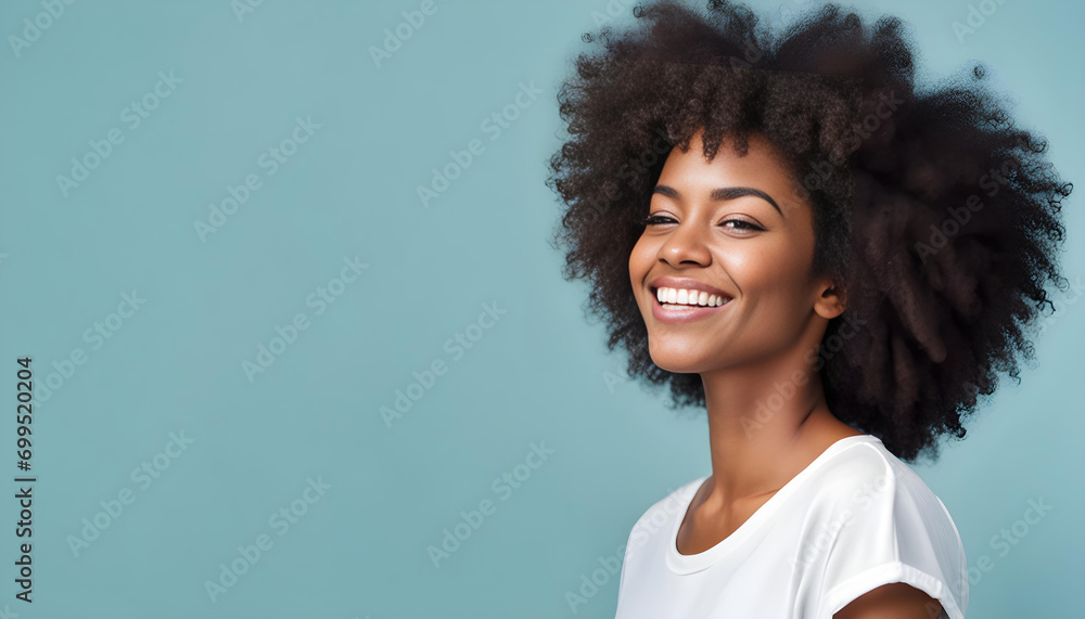 Portrait of a Young Black Woman with Smile - Light Blue Background with Empty Space Portrait of a Young Black Woman with Smile - Light Blue Background with Empty Space