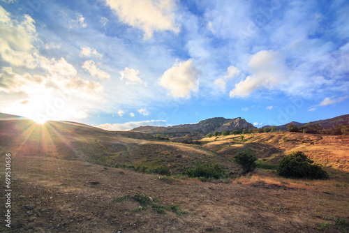 Beautiful sunshine on the mountains © Yuri Bizgaimer