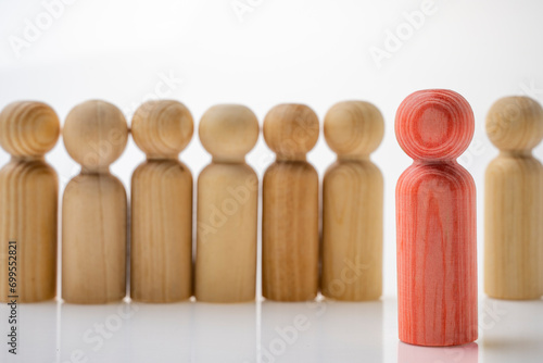 Closeup view row of wooden figure