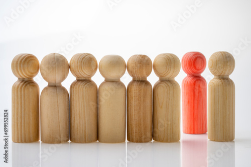 Closeup view row of wooden figure