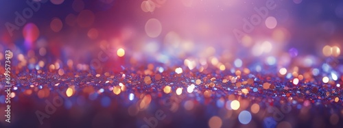 Decorative festive abstract purple glitters with blurred bokeh effect background. Christmas, New Year, holidays decoration banner