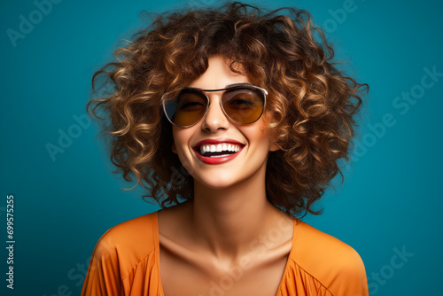 Woman with smile and sunglasses on her face.