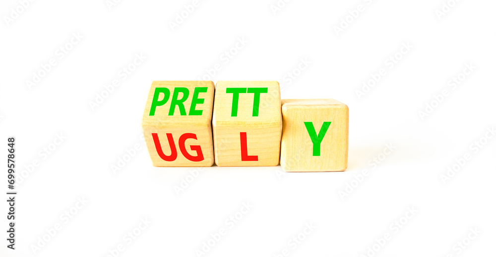 Pretty or ugly symbol. Concept word Pretty or Ugly on wooden cubes. Beautiful white table white background. Business lifestyle and pretty or ugly concept. Copy space. Pretty or ugly symbol. Concept word Pretty or Ugly on wooden cubes. Beautiful white table white background. Business lifestyle and pretty or ugly concept. Copy space.