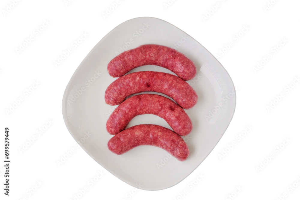 Sausages isolated on white background. Homemade minced meat. Cooking at home. Fast food. Sausages isolated on white background. Homemade minced meat. Cooking at home. Fast food.