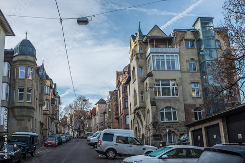 Wohnsiedlung mit Villen in Stuttgart Dobel vor blauem Himmel mit Wolken photo