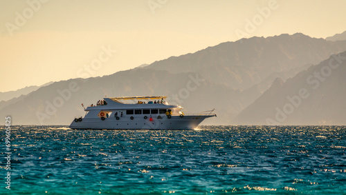big boat on the background of high mountains in Egypt Dahab South Sinai