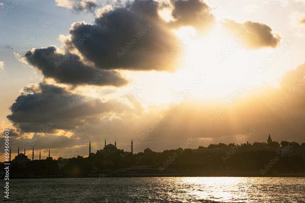 Silhouette of the historical peninsula of Istanbul and dramatic clouds at sunset