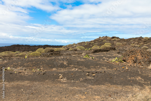 Spectacular view of the volcanic landscape in Timanfaya National Park. Lanzarote, Canary Islands, Spain, Atlantic, Europe. Tourism and vacations concept.