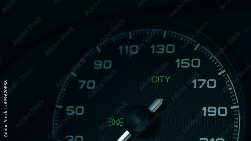 CITY sign appears on speedometer of a modern car, close-up shot. Transportation safety and speed limit concepts CITY sign appears on speedometer of a modern car, close-up shot. Transportation safety and speed limit concepts