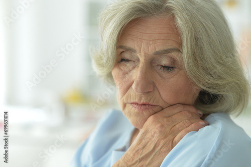 Close up portrait of sick old woman