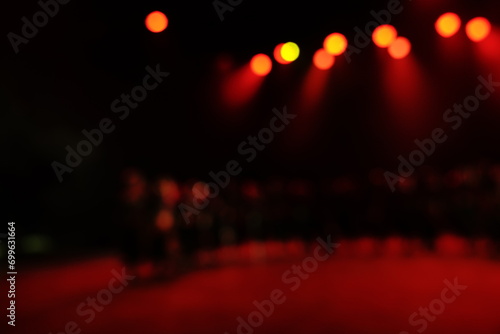 Defocused entertainment concert lighting on stage, blurred disco party and Concert Live. © Leo Li