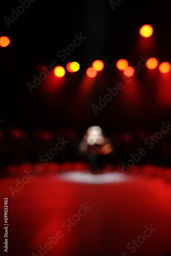 Defocused entertainment concert lighting on stage, blurred disco party and Concert Live.