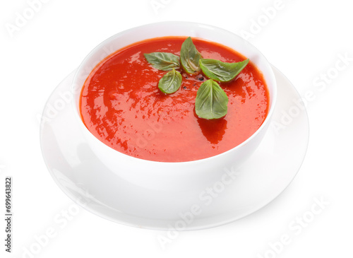 Obraz na plátně Delicious tomato cream soup in bowl isolated on white
