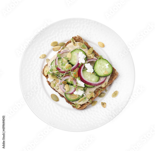 Tasty vegan sandwich with cucumber, onion, hummus and pumpkin seeds isolated on white, top view