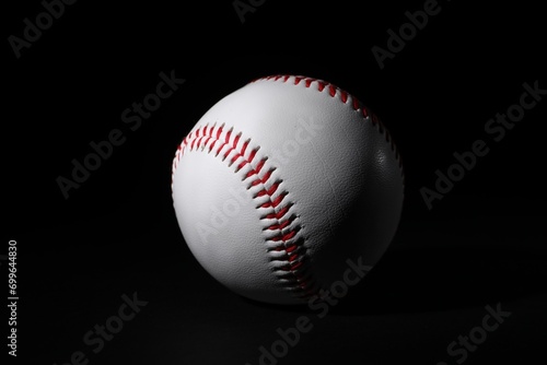 One leather baseball ball on black background