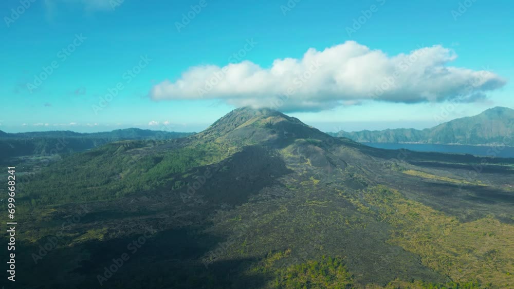 Aerial view on Batur volcano with clouds in Bali, Indonesia. Aerial view on Batur volcano with clouds in Bali, Indonesia.