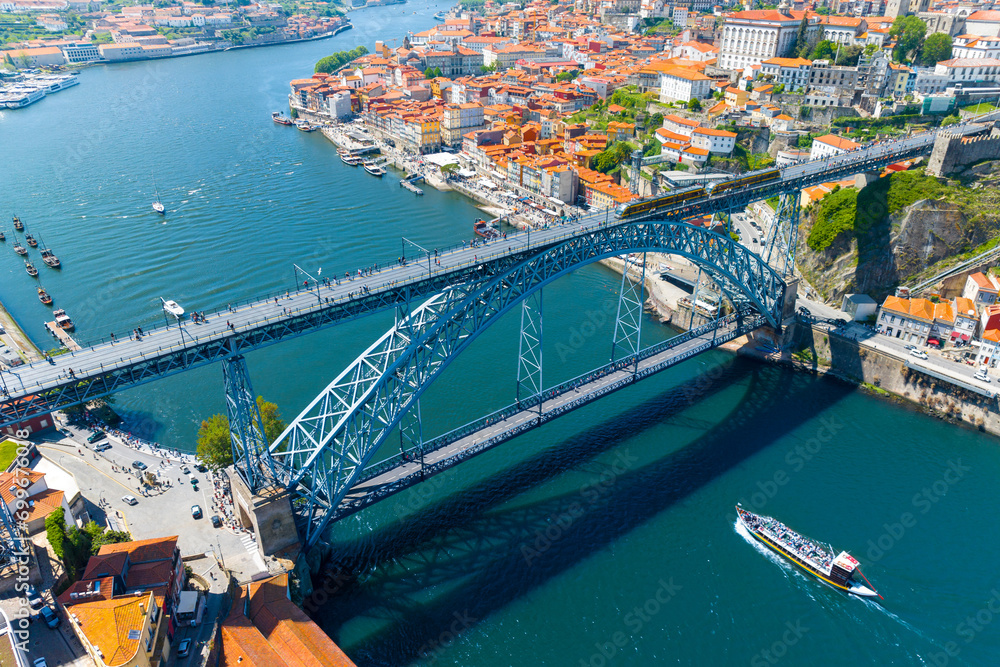 Famous bridge Ponte dom Luis above old town of Porto at river Duoro, Portugal