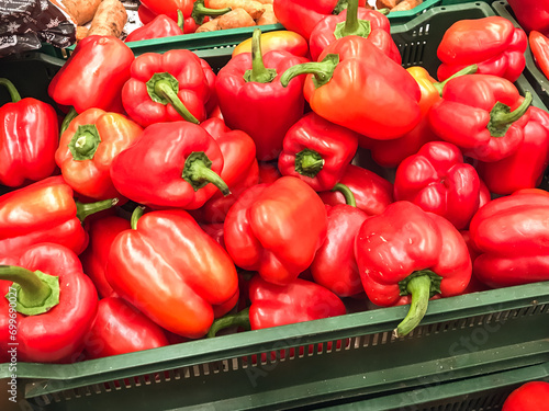 Pepper Bell in the box, for eating vegetable red fresh juicy, lying in a drawer in supermarket. concept healthy food vitamins