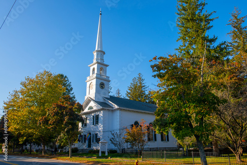 First Unitarian Church with fall foliage at 223 Main Street, in historic town center of Kingston, Massachusetts MA, USA. photo