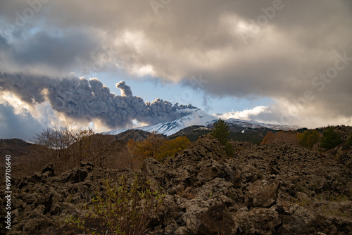 Eruptive vent with lava emis at the top of the Etna volcano photo