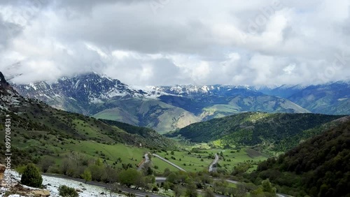 Wallpaper Mural Tseylomsky pass in Ingushetia. A trip uphill to the Tsei Loam pass on a cloudy spring day. Panorama of the high cliffs of the Dzheyrakh gorge. North Caucasus, Russia. 4К Torontodigital.ca