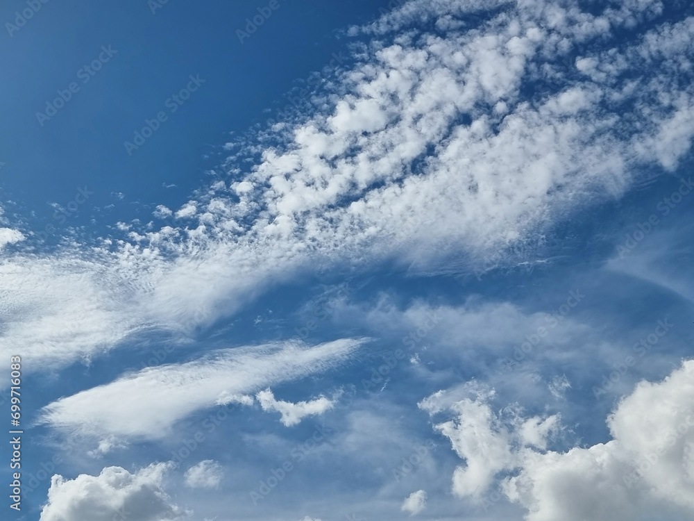 Fototapeta premium abstract outdoor blue sky high and long white clouds background in summer gradient light beauty background. beautiful bright cloud and calm fresh wind air