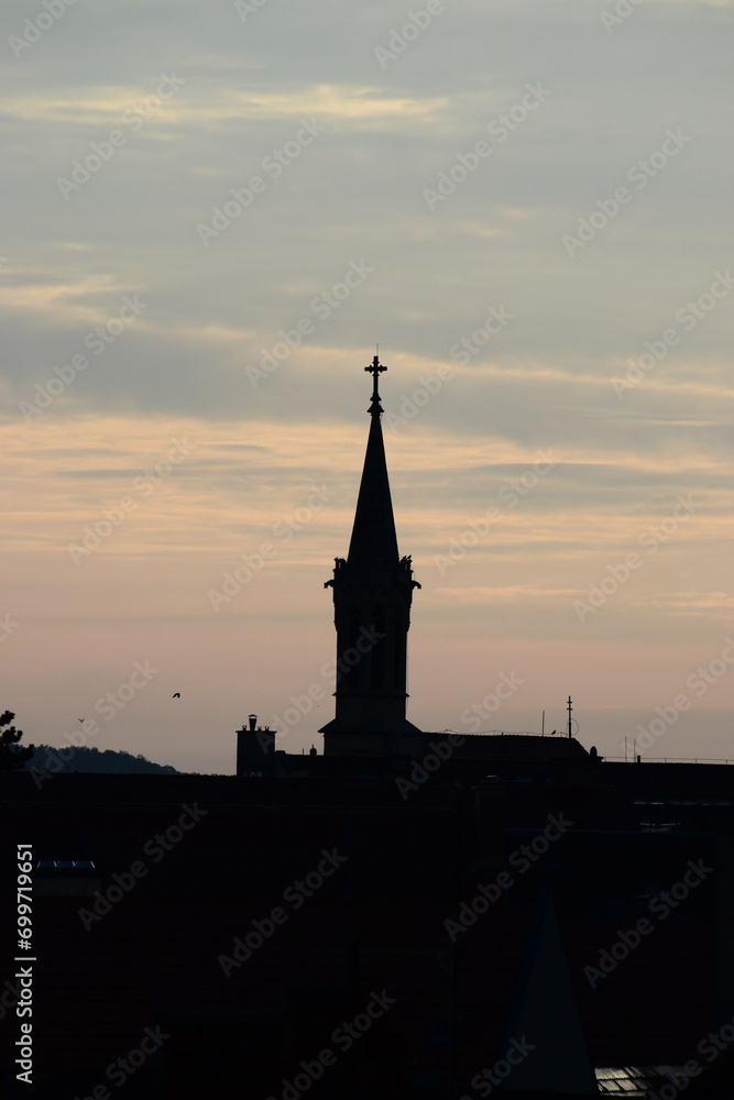 Obraz premium sunset over the church