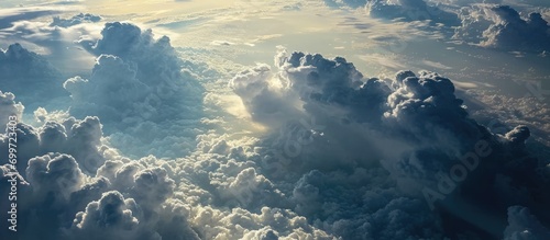 Airborne perspective of rainstorm clouds covering Earth. photo