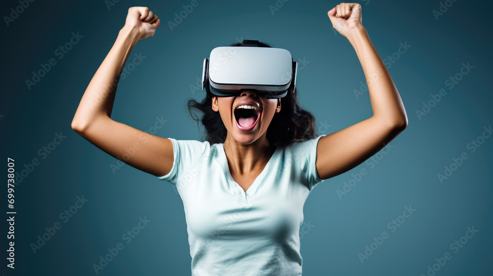 Woman wearing a virtual reality headset with a delighted expression Woman wearing a virtual reality headset with a delighted expression