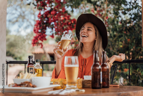 woman drinking a beer
