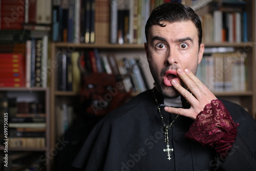 Tableau sur toile Shocked priest with his mouth open