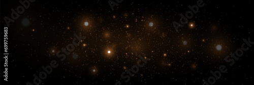 Gold dust light and glare particles. Magic light effect. Christmas glowing dust background.