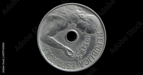 Obverse of Spain coin 25 centimos 1934, isolated in black background. 3d animation in 4k video. photo