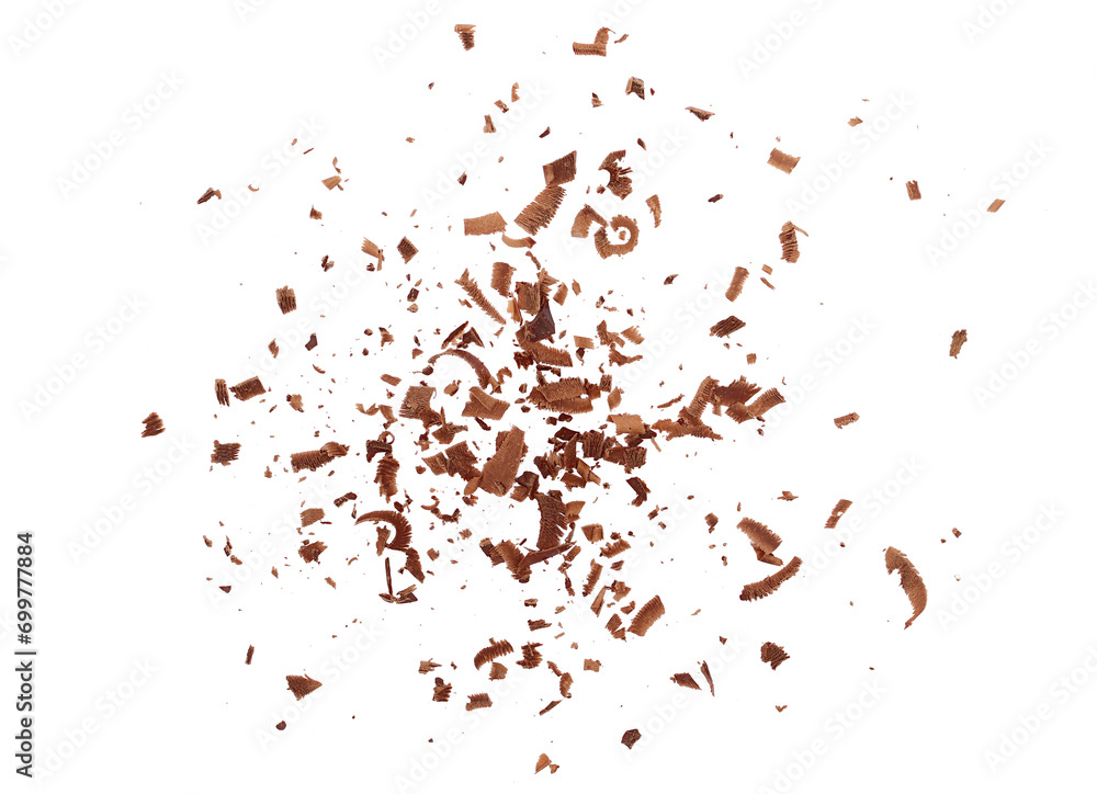 Pile scraped, milled dark chocolate shavings isolated on white 