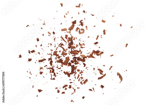 Pile scraped, milled dark chocolate shavings isolated on white 