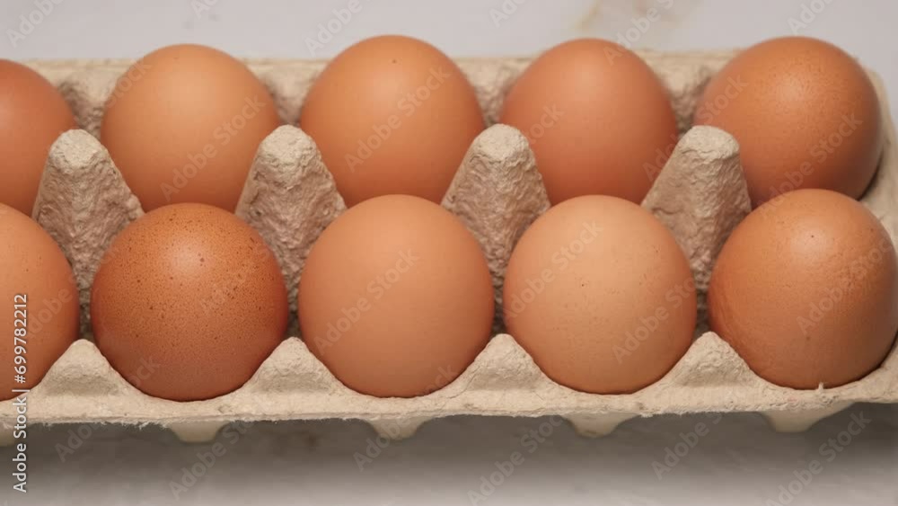 Fresh chicken eggs in cardboard cells. Fresh chicken eggs in cardboard cells.