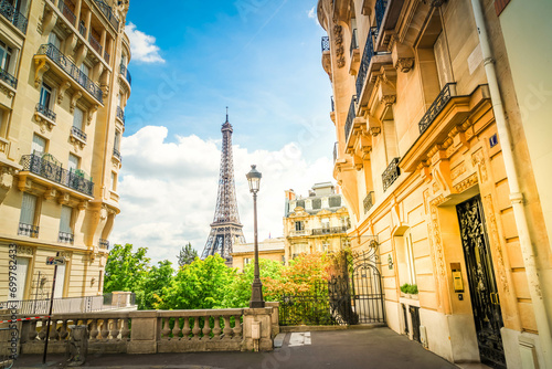 famous Eiffel Tower landmark and Paris summer street, Paris citscape, France, toned