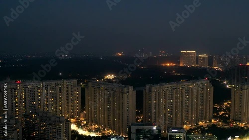 Bright beautiful skyline of city at night shot by drone