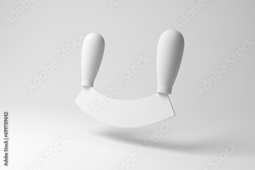 White mezzaluna herb chopper floating in mid air on white background in monochrome and minimalism. Illustration of the concept of kitchenware and culinary photo