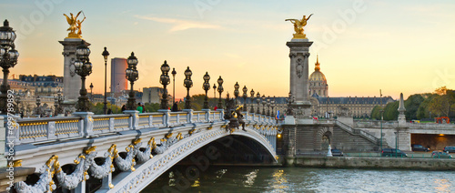 Fotografie Alexandre III Bridge at sunset in Paris, France