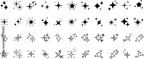 Set of sparkles star icons.Rating star .Bright vector stars.Flash shine sparkle icon glare light blink star. Modern simple black stars collection.