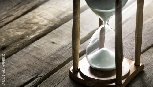 Hourglass with Running Sand - Concept of Time - Time is Money - Time is Running Out